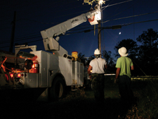 line crew working at night