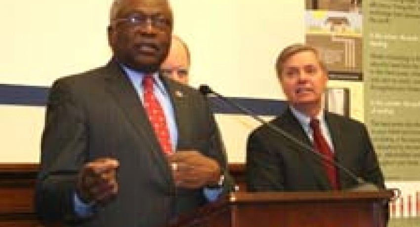 House Majority Whip James E. Clyburn, D-SC discusses legislation to create the Rural Energy Savings Program. Looking on are Rep. John Spratt, D-SC and Sen. Lindsey Graham, R-SC.